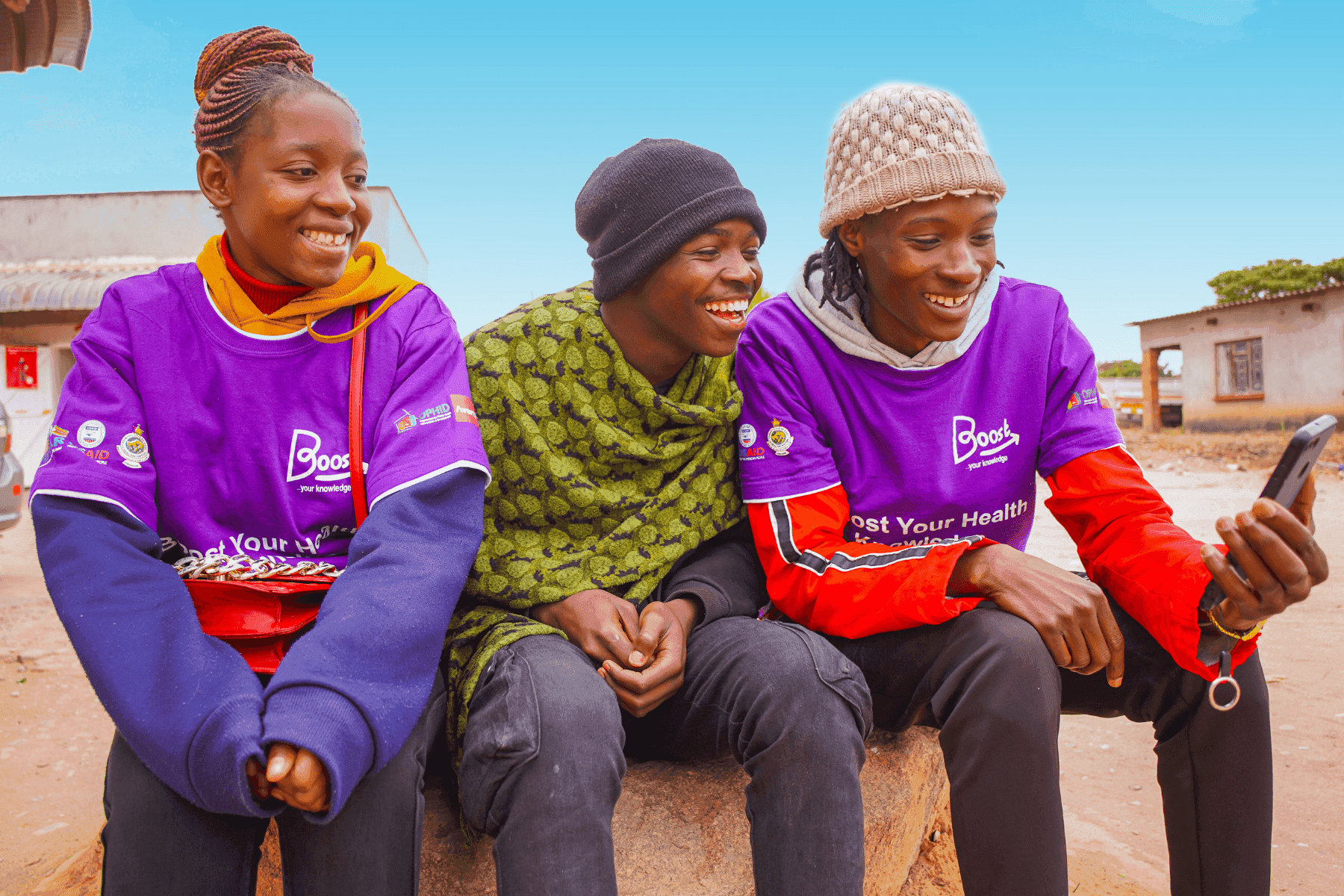 Community health workers and client using Boost